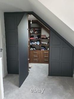 Loft Slope roof alcove angled wardrobe storage, sliding Hinged doors