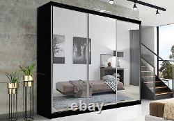 Armoire coulissante élégante pour chambre avec éclairage LED, grand espace de rangement et design